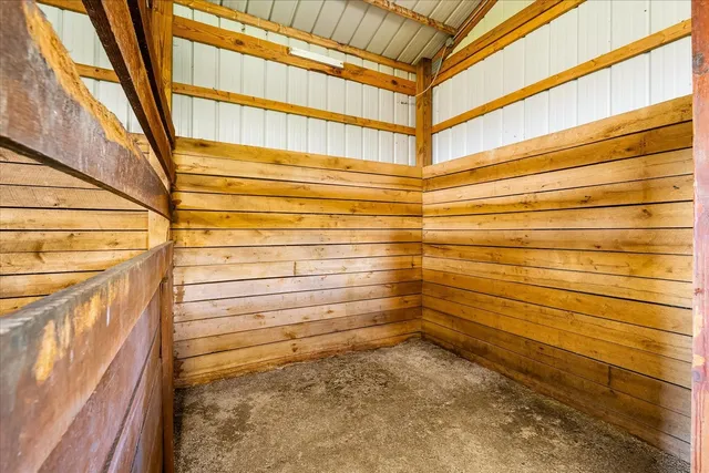 an aerial view of a house with garden space sitting space and swimming pool