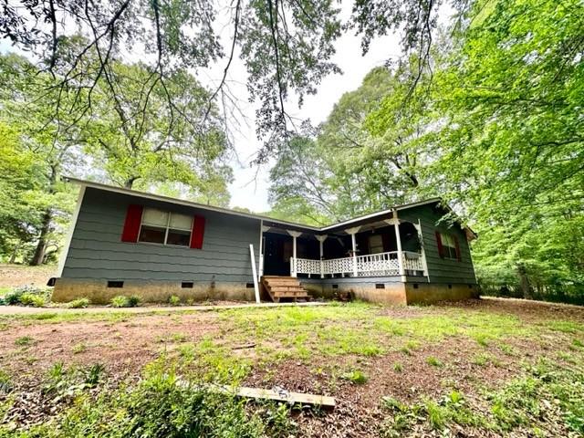628 McCreery Road Jefferson, GA 30549 - Photo 1 of 1 a front view of house with yard and seating space