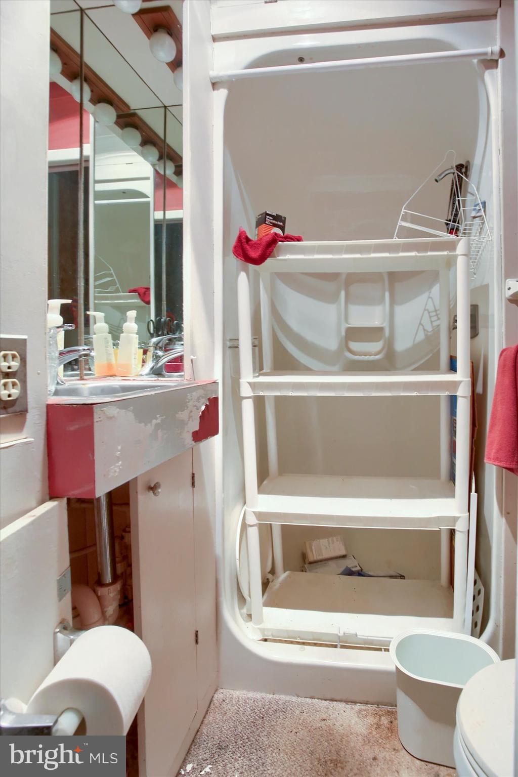 1025 Roberts Valley Road Harrisburg, PA 17110 - Photo 21 of 38 a bathroom with a toilet and a sink