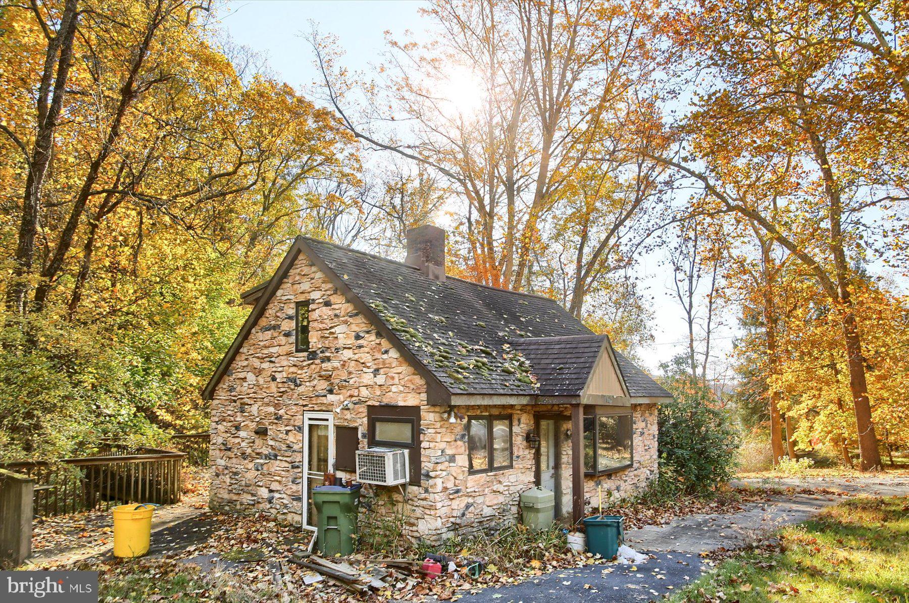 1025 Roberts Valley Road Harrisburg, PA 17110 - Photo 5 of 38 front view of a house with a trees