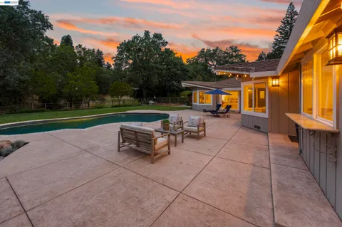 a view of swimming pool from a outdoor space