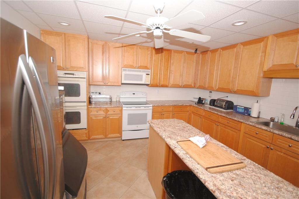 1997 Southwest Palm City Road, Unit I Stuart, FL 34994 - Photo 26 of 36 Community Kitchen