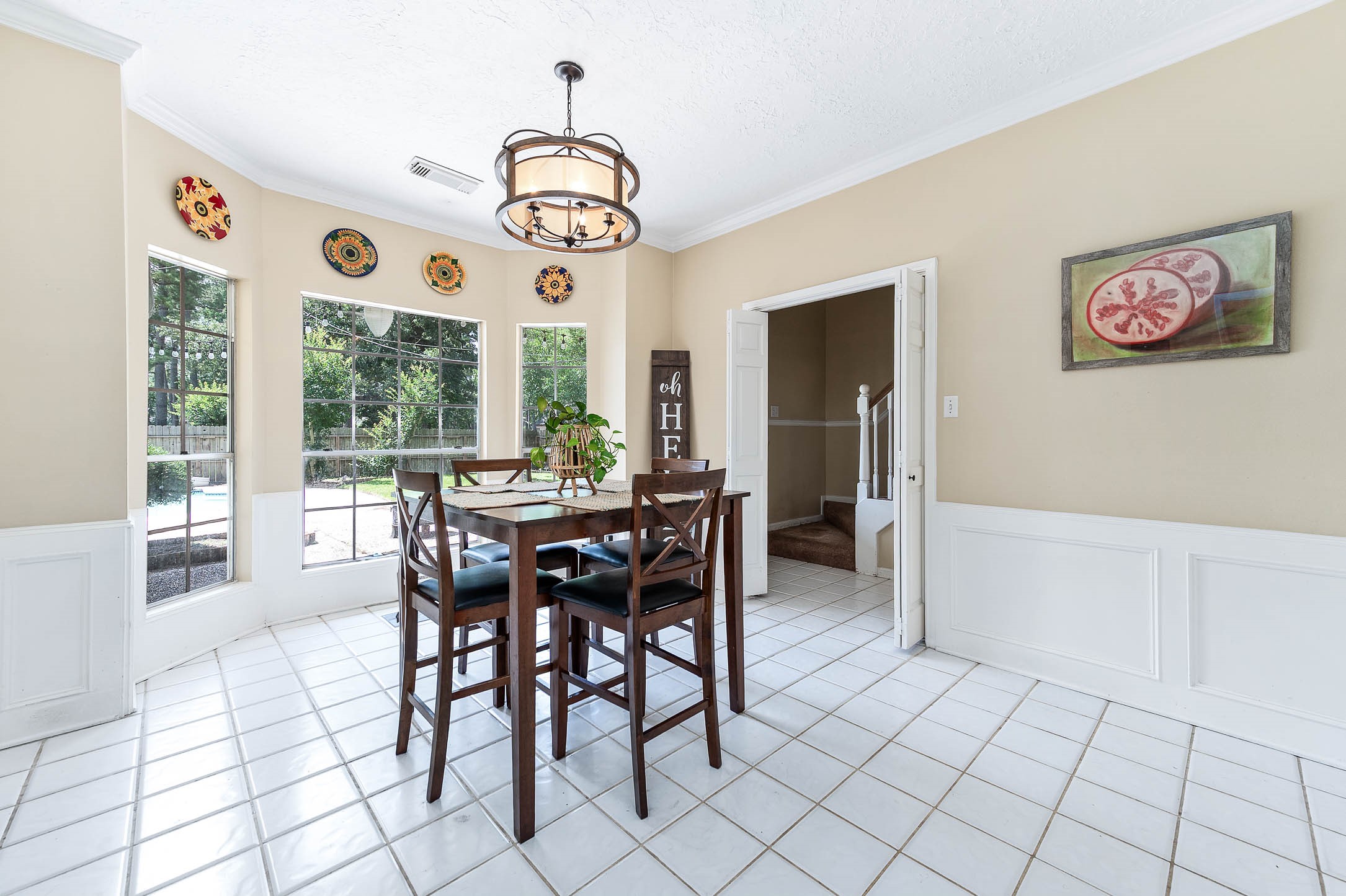 9911 Oxted Lane Spring, TX 77379 - Photo 16 of 39 a dining room with furniture and window