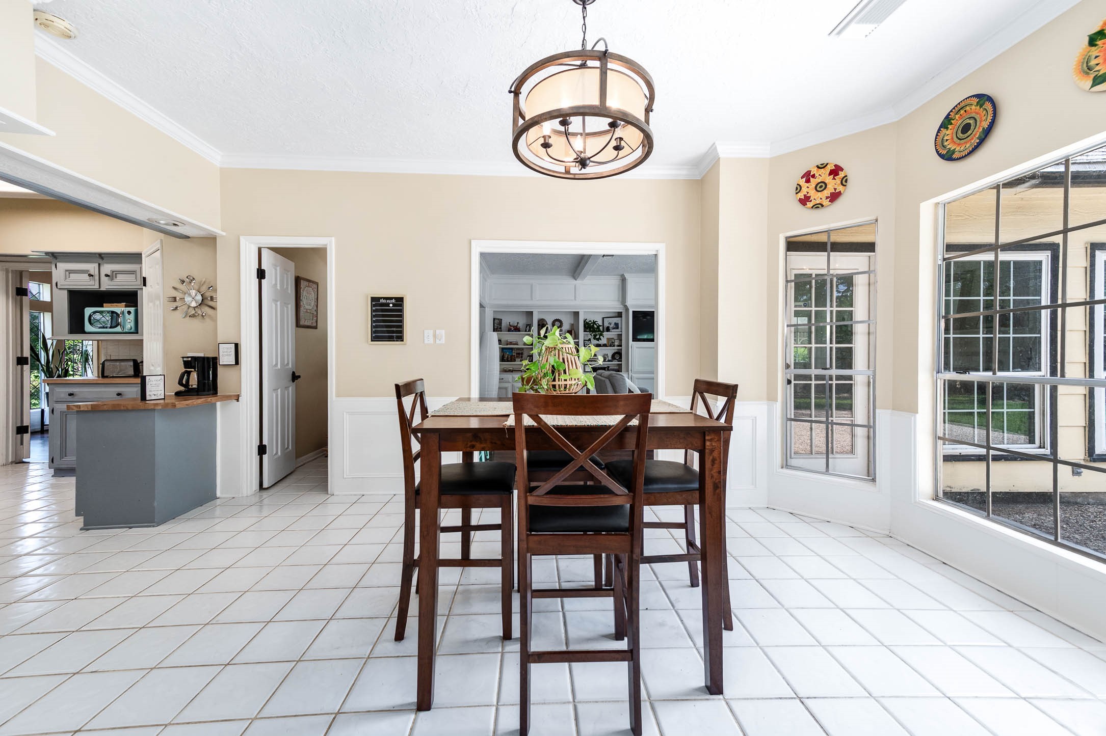 9911 Oxted Lane Spring, TX 77379 - Photo 17 of 39 a view of a dining room with furniture window and outside view
