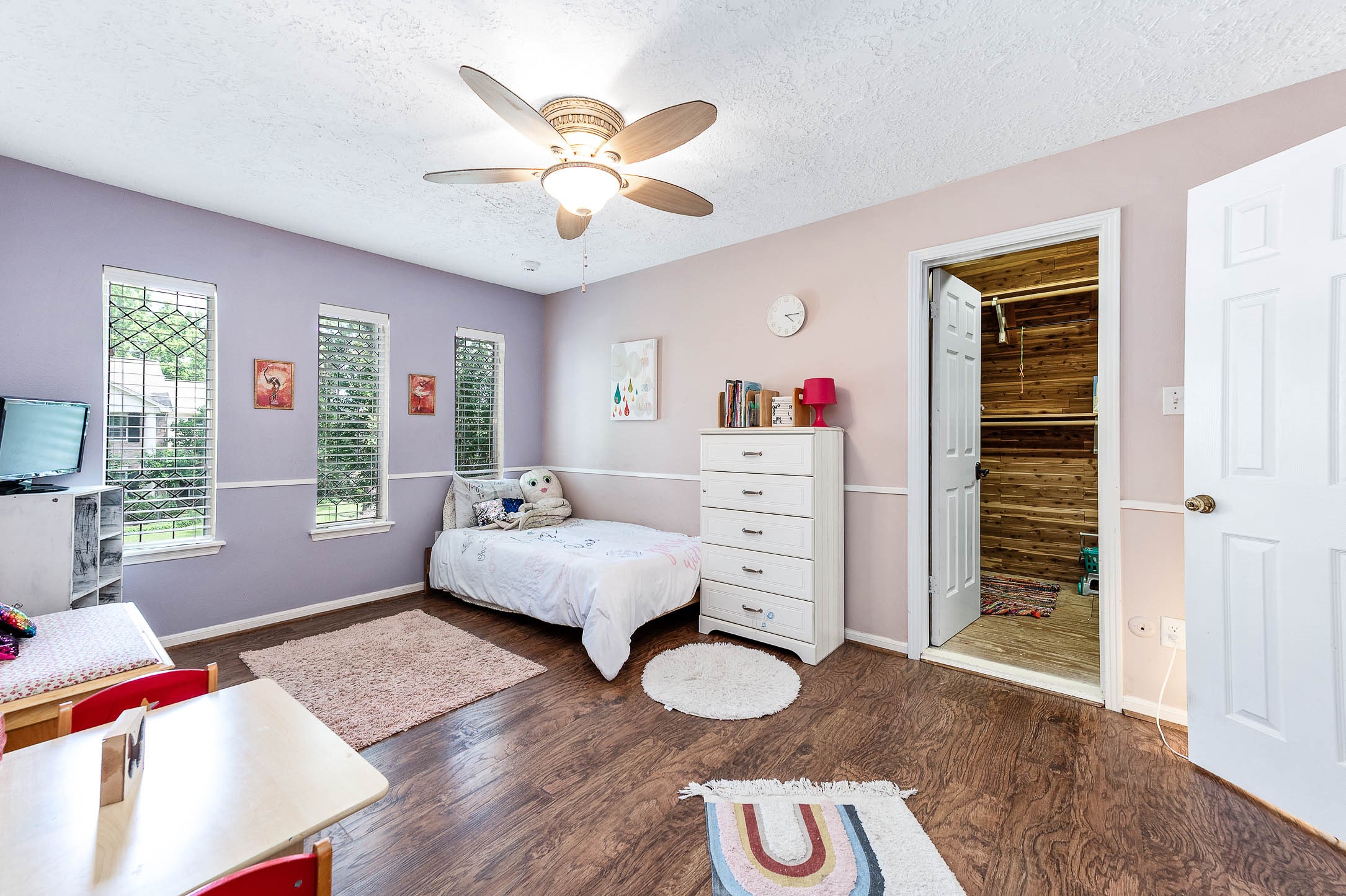 9911 Oxted Lane Spring, TX 77379 - Photo 27 of 39 a bedroom with a bed and a window