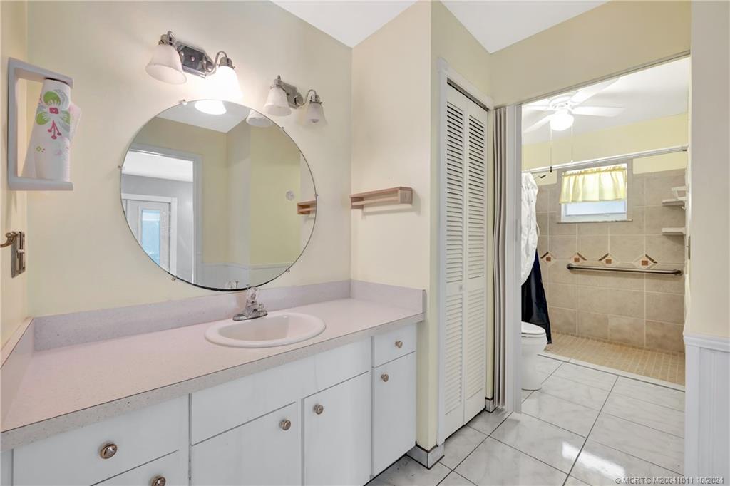 6806 Southwest Chase Court Stuart, FL 34997 - Photo 16 of 37 Main Bathroom is Handicap Accessible