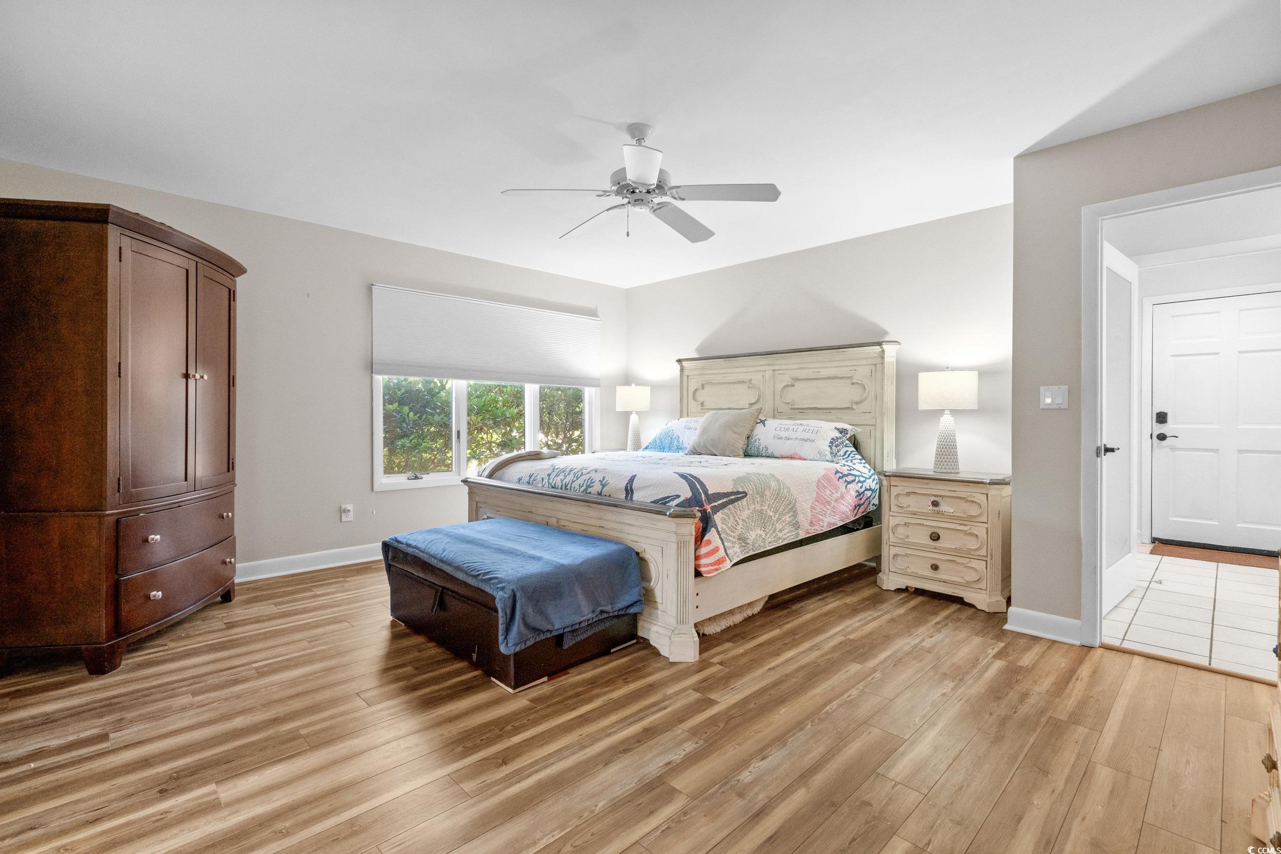 1044 Links Road Myrtle Beach, SC 29575 - Photo 24 of 40 Bedroom with light wood-type flooring and ceiling fan