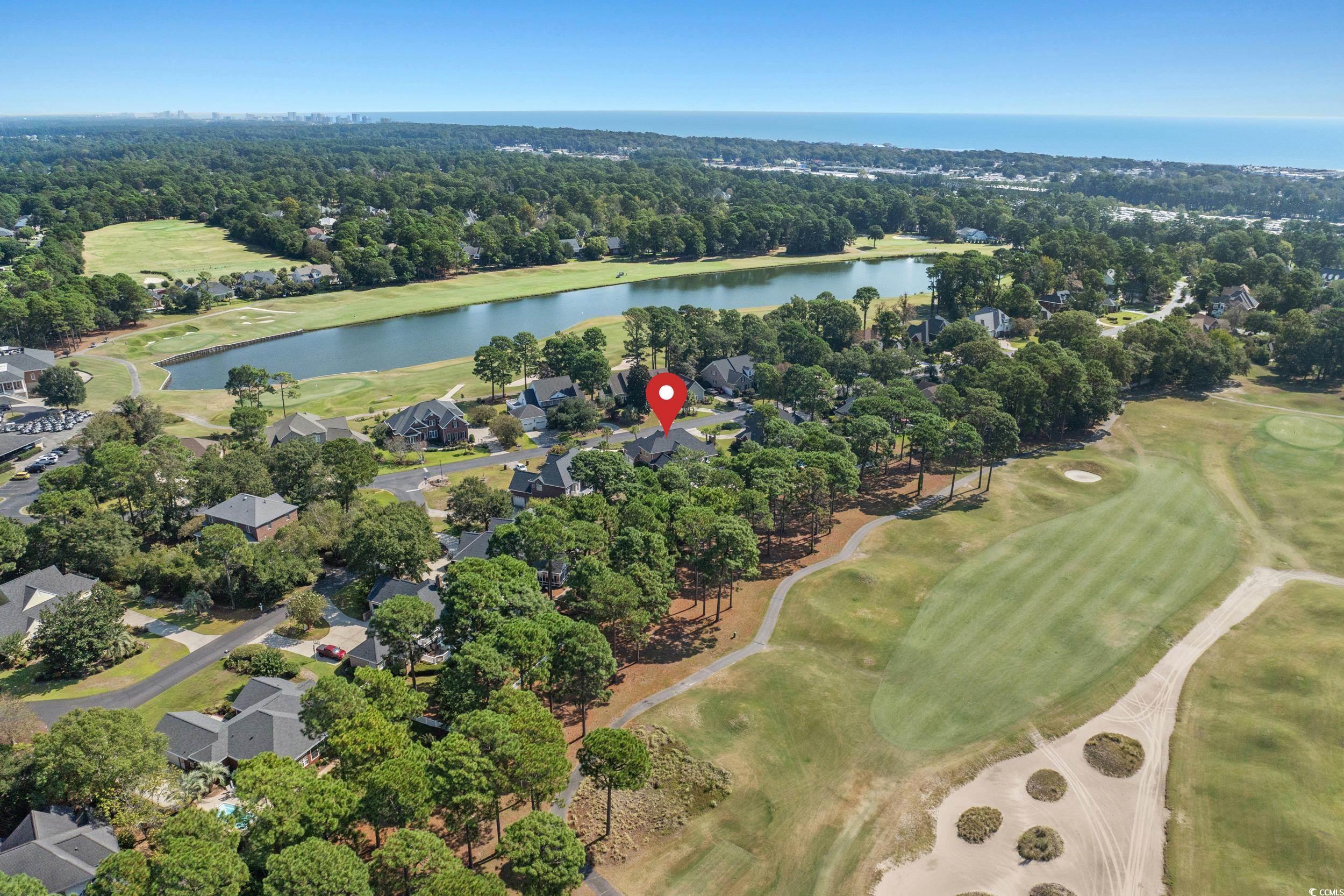 1044 Links Road Myrtle Beach, SC 29575 - Photo 4 of 40 Aerial view of property and surrounding area featuring a golf club and nearby suburban area
