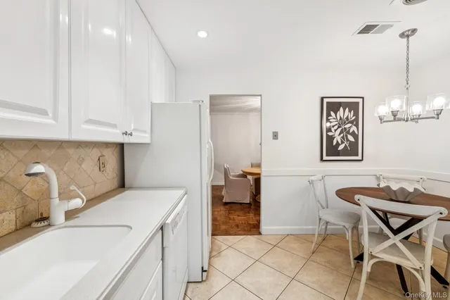 a kitchen that has a cabinets counter space and appliances