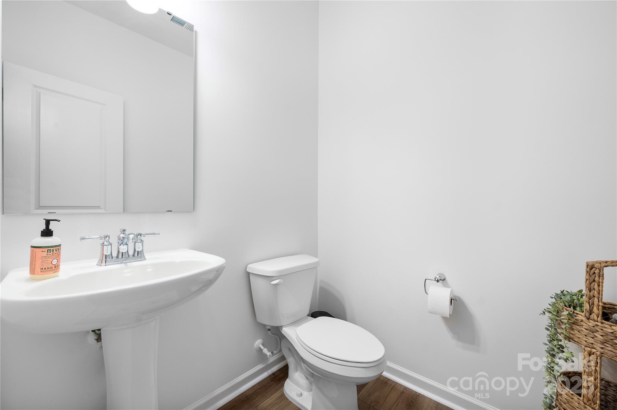 699 Kitfox Drive Northwest Concord, NC 28027 - Photo 15 of 33 a bathroom with a toilet sink and mirror