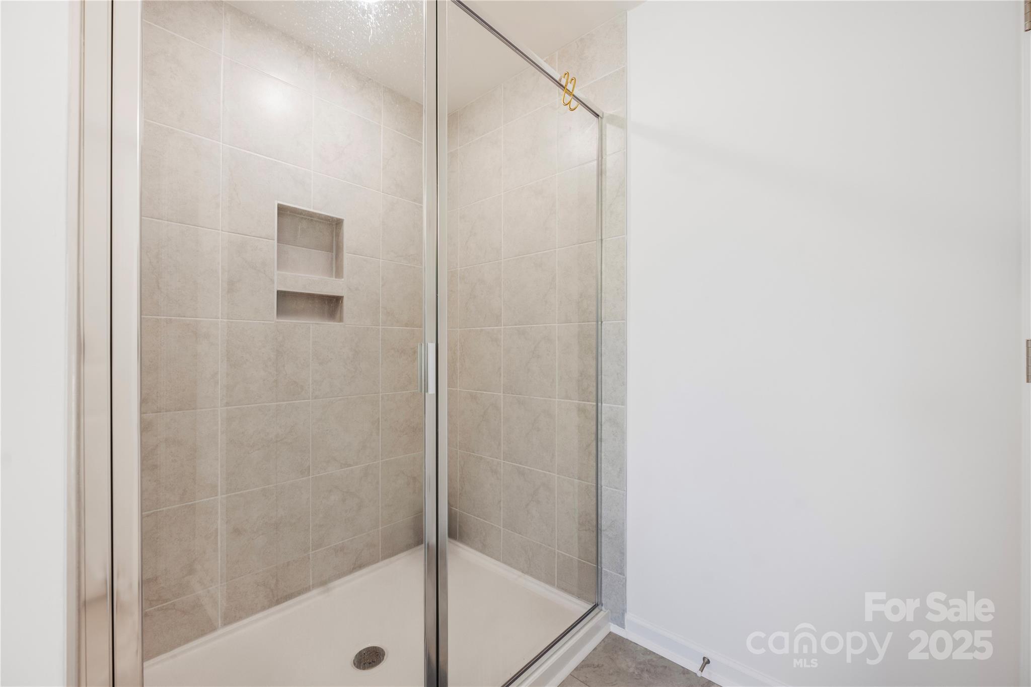 699 Kitfox Drive Northwest Concord, NC 28027 - Photo 19 of 33 a bathroom with a bathtub
