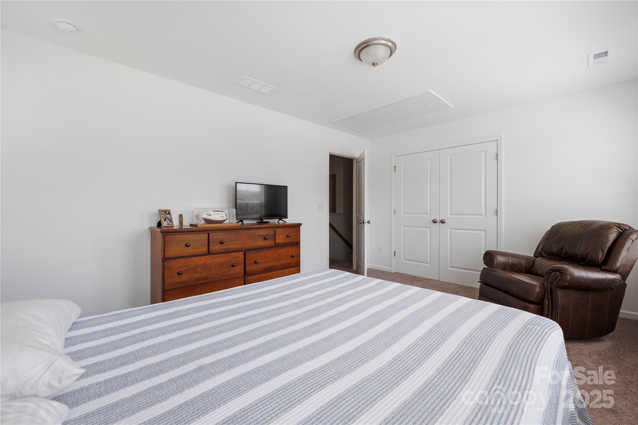 699 Kitfox Drive Northwest Concord, NC 28027 - Photo 22 of 33 a bed room with a bed and furniture