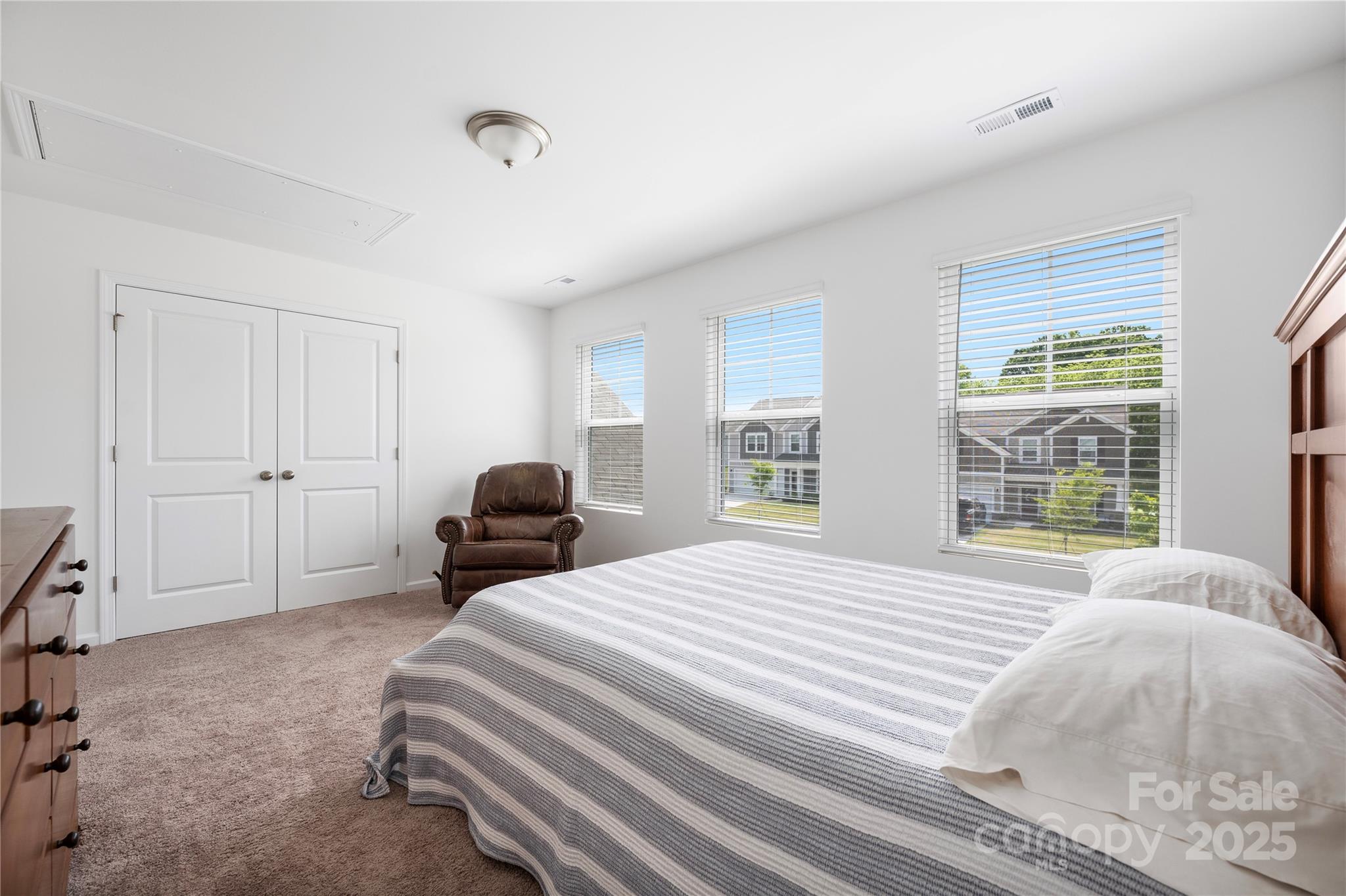 699 Kitfox Drive Northwest Concord, NC 28027 - Photo 23 of 33 a bedroom with a bed and a window
