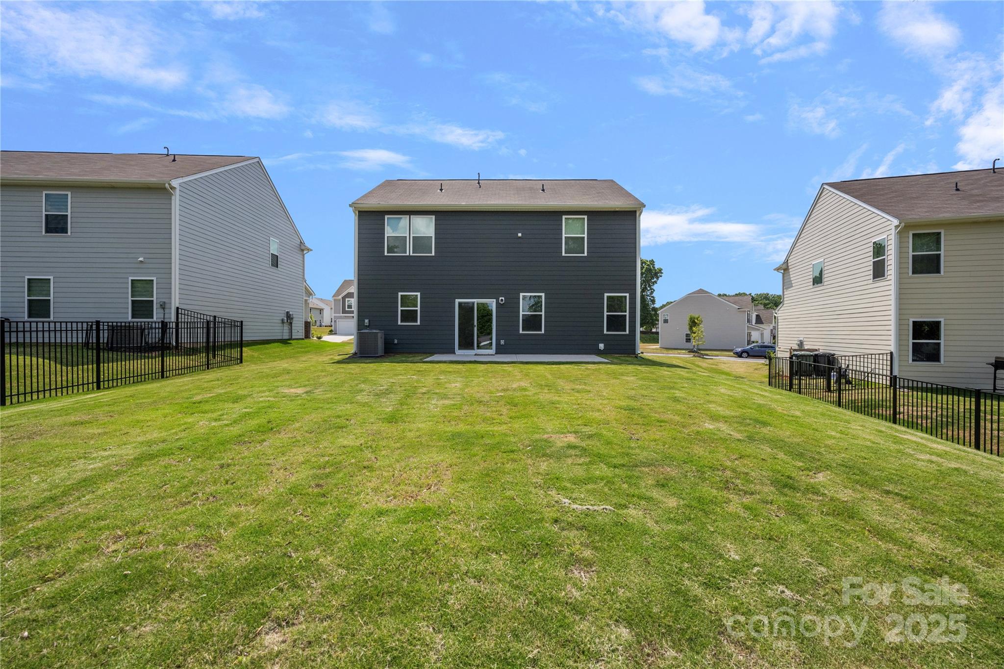 699 Kitfox Drive Northwest Concord, NC 28027 - Photo 27 of 33 a view of a house with a yard