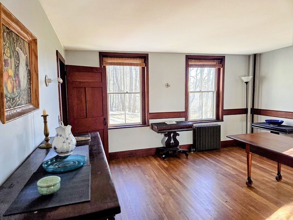 78 Shaker Road Harvard, MA 01451 - Photo 13 of 42 a living room with furniture and a wooden floor