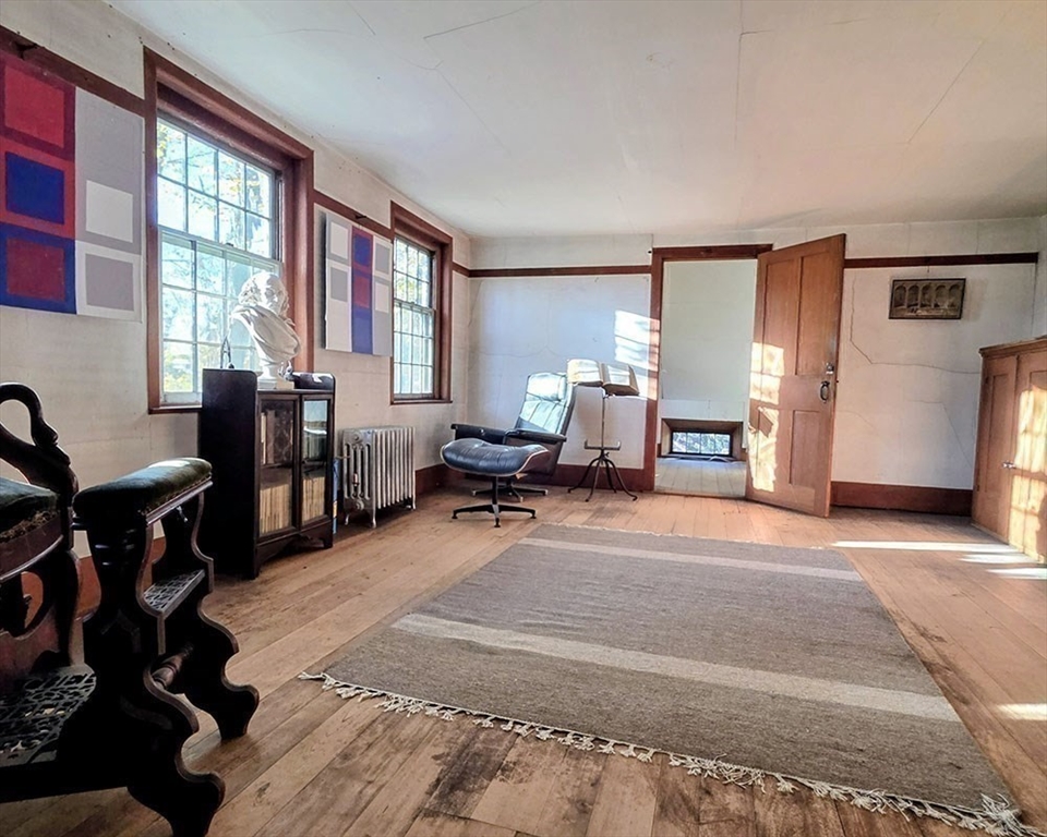 78 Shaker Road Harvard, MA 01451 - Photo 32 of 42 a living room with furniture and a window