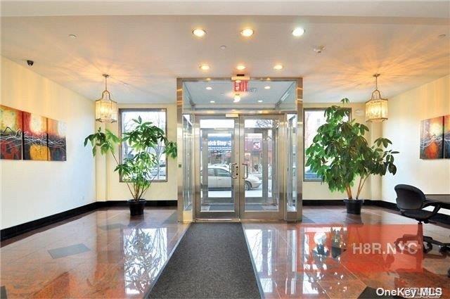 40-40 75th Street, Unit 3J Queens, NY 11373 - Photo 2 of 17 a view of a living room and dining room