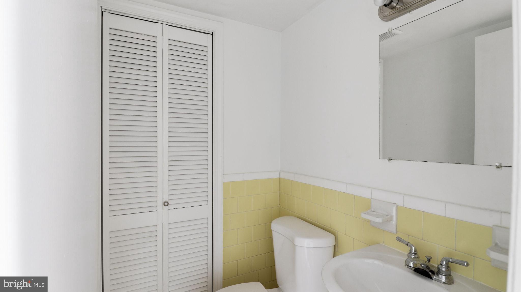 1601 Addison Road South District Heights, MD 20747 - Photo 11 of 21 a bathroom with a sink and a bathtub