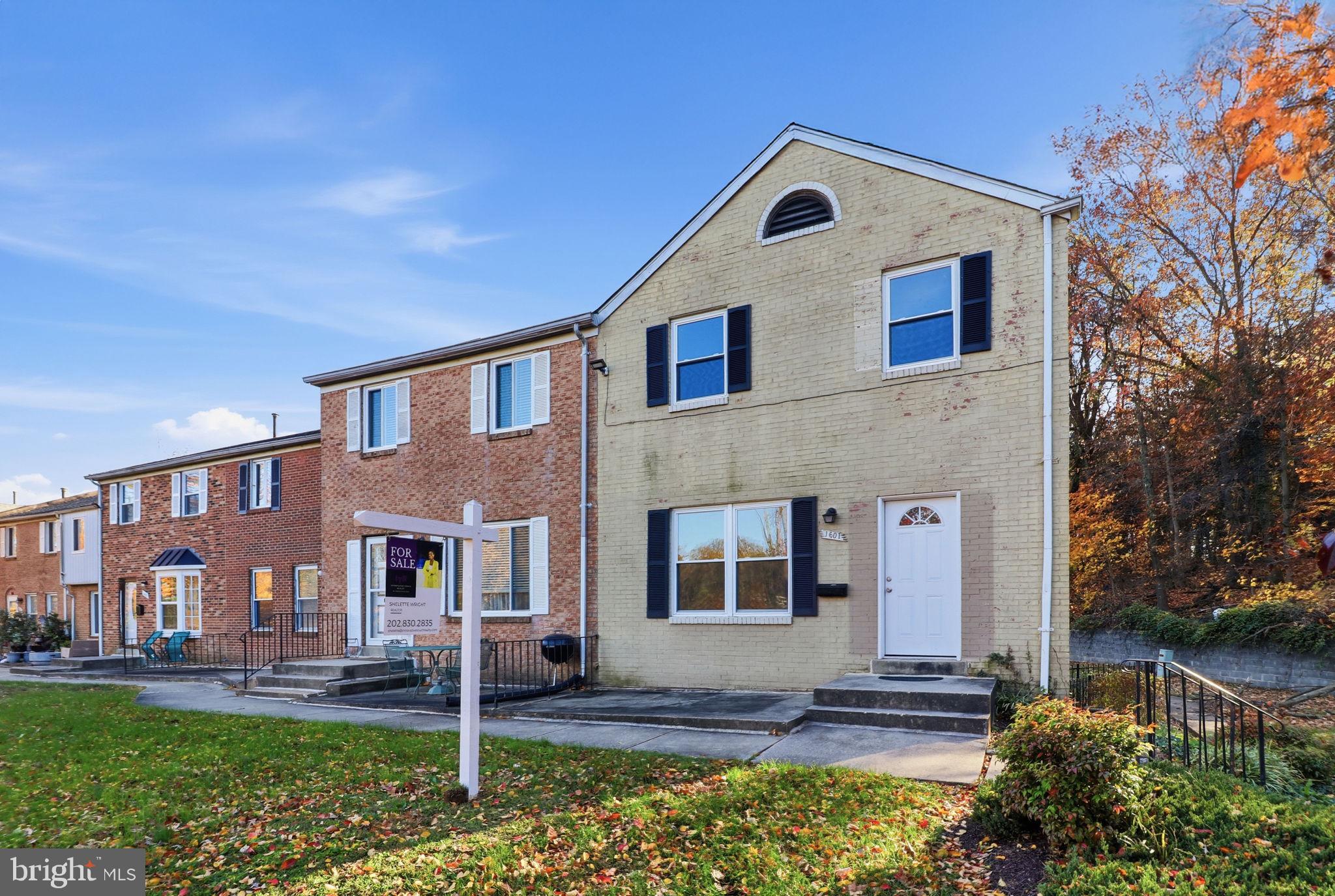 1601 Addison Road South District Heights, MD 20747 - Photo 2 of 21 a front view of a house with a yard