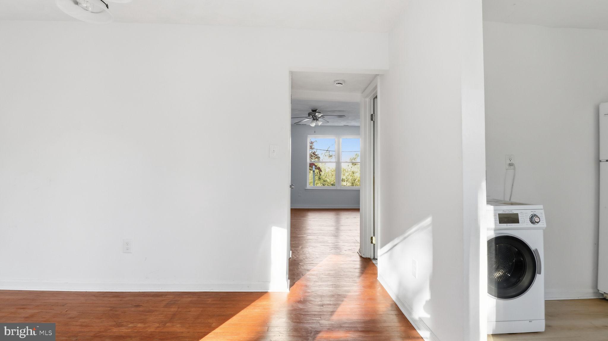 1601 Addison Road South District Heights, MD 20747 - Photo 7 of 21 a view of a hallway with washer and dryer