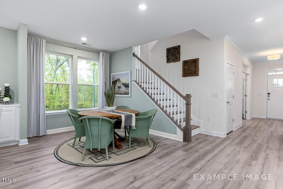 225 Highland Ridge Lane Knightdale, NC 27545 - Photo 11 of 38 a living room with furniture