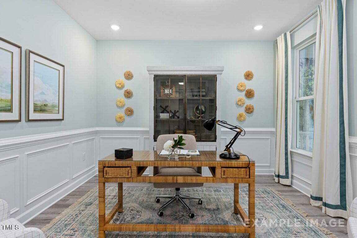 225 Highland Ridge Lane Knightdale, NC 27545 - Photo 7 of 38 a view of a workspace with furniture