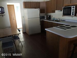 6 Cr 2084 Alpine, AZ 85920 - Photo 4 of 25 a kitchen with a appliances a sink and a stove