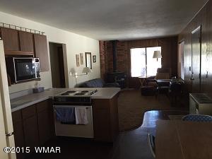 6 Cr 2084 Alpine, AZ 85920 - Photo 7 of 25 a kitchen with a stove and a refrigerator