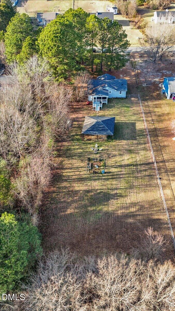 107 Claymont Road Louisburg, NC 27549 - Photo 25 of 30 a view of a yard with plants