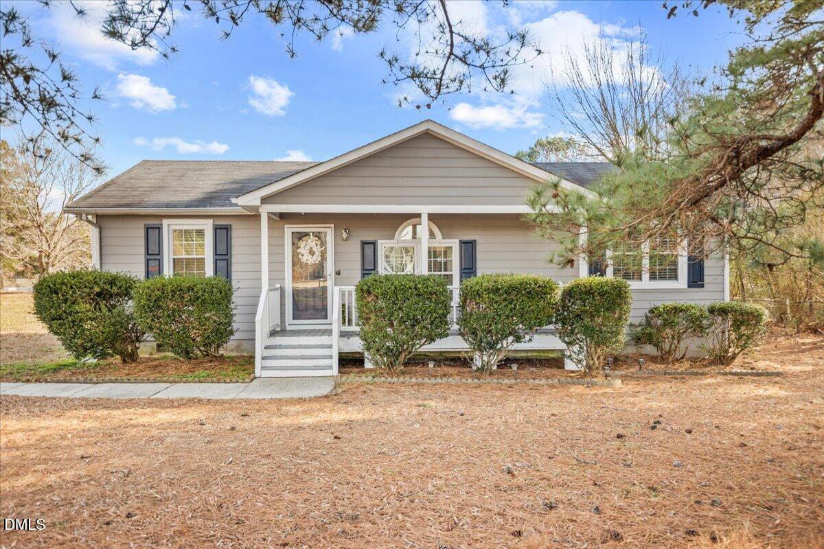 107 Claymont Road Louisburg, NC 27549 - Photo 27 of 30 a view of a house with a yard
