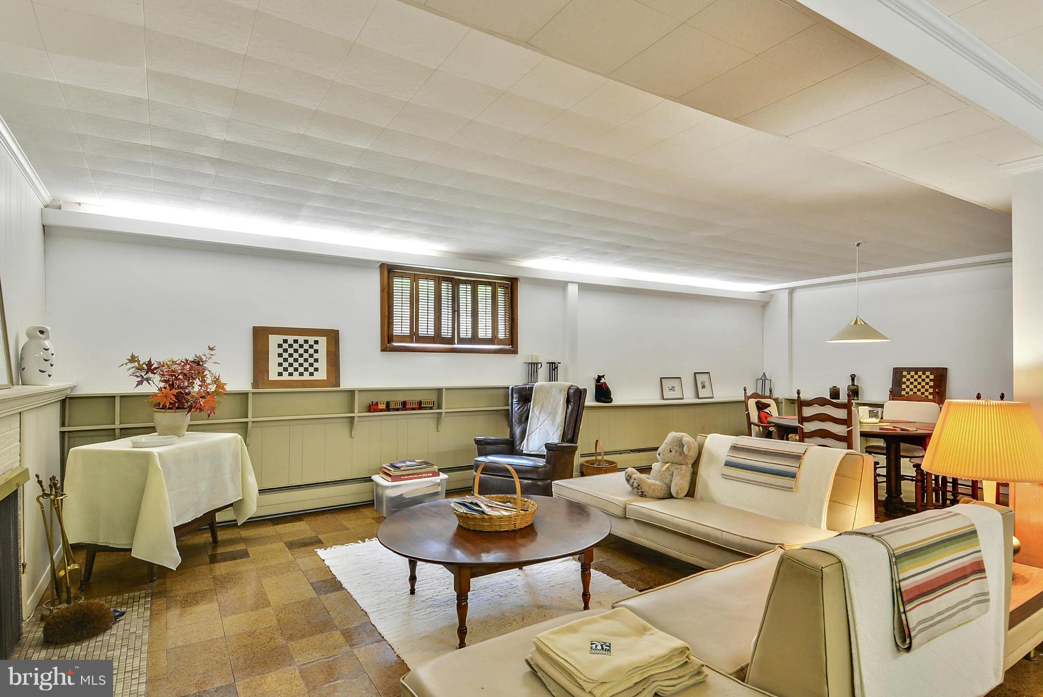 1939 Kimberly Road Silver Spring, MD 20903 - Photo 20 of 30 a living room with furniture and a wooden floor