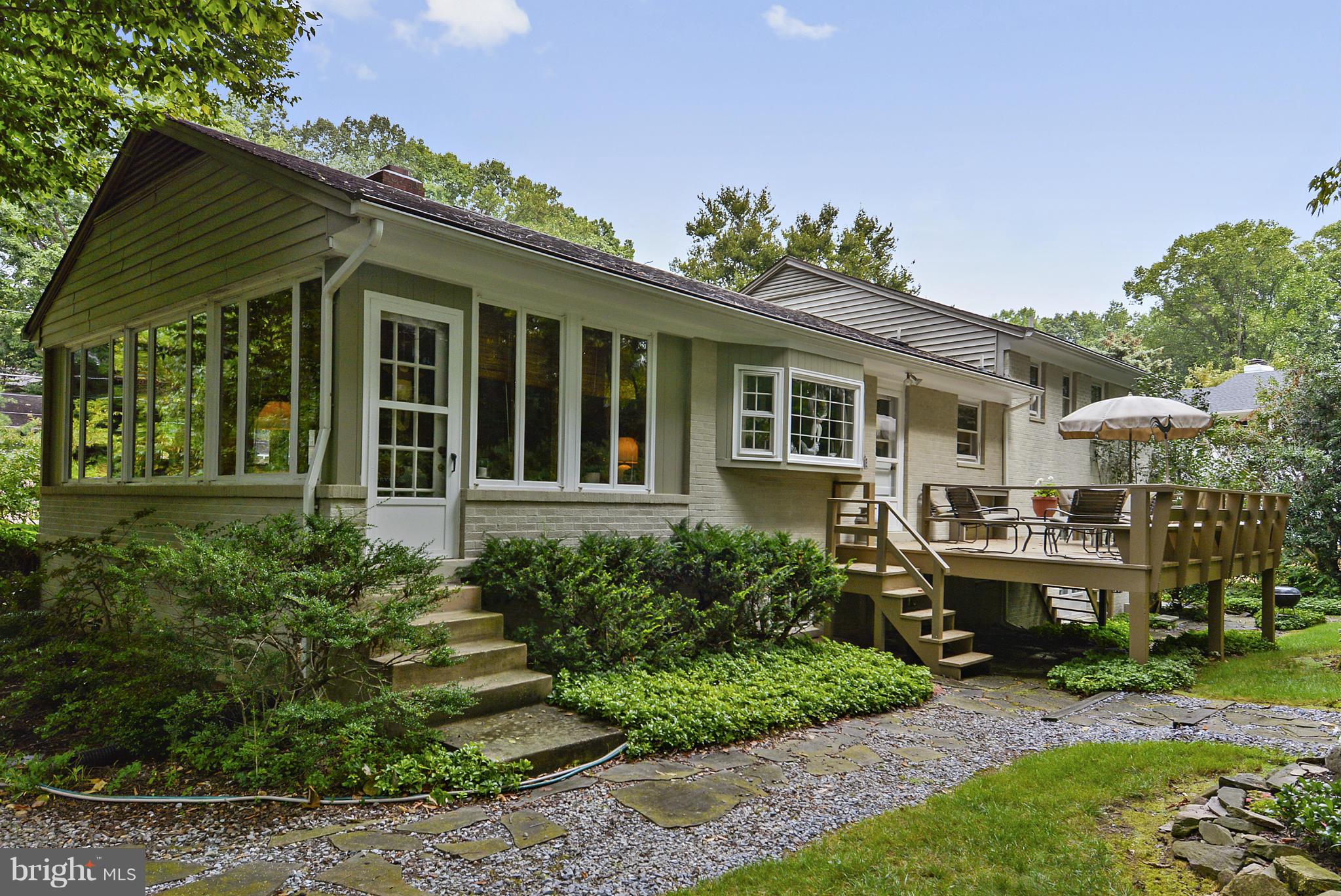 1939 Kimberly Road Silver Spring, MD 20903 - Photo 3 of 30 a front view of a house with a garden