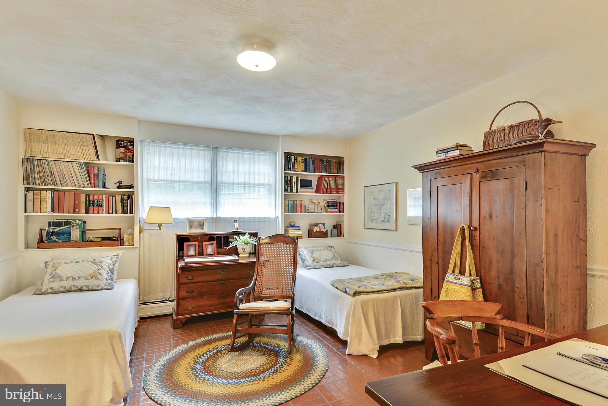 1939 Kimberly Road Silver Spring, MD 20903 - Photo 28 of 30 a bedroom with furniture and a wooden floor