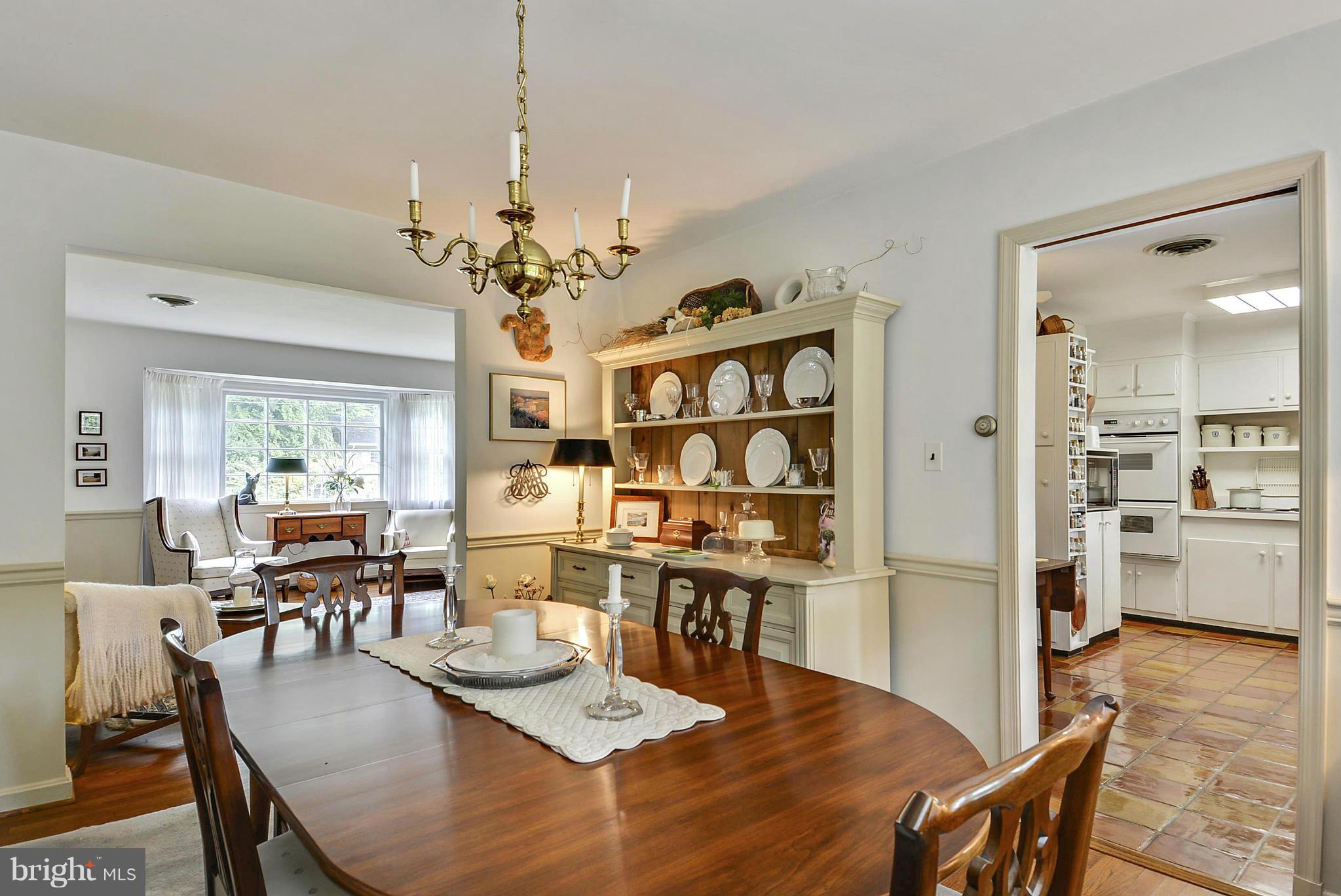 1939 Kimberly Road Silver Spring, MD 20903 - Photo 10 of 30 a view of a dining room with furniture and wooden floor