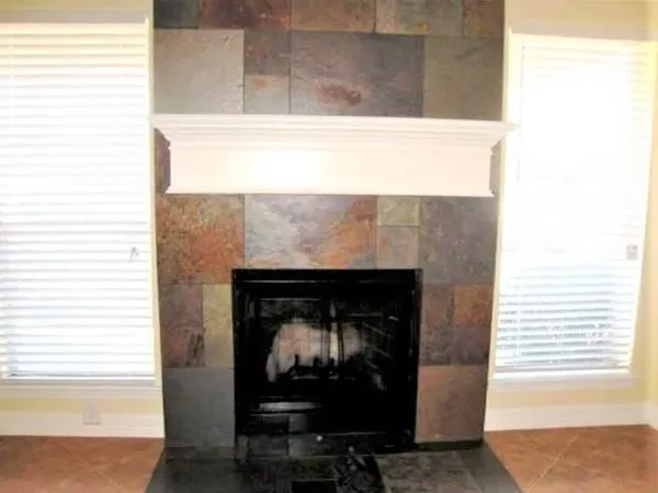 a living room with a fireplace