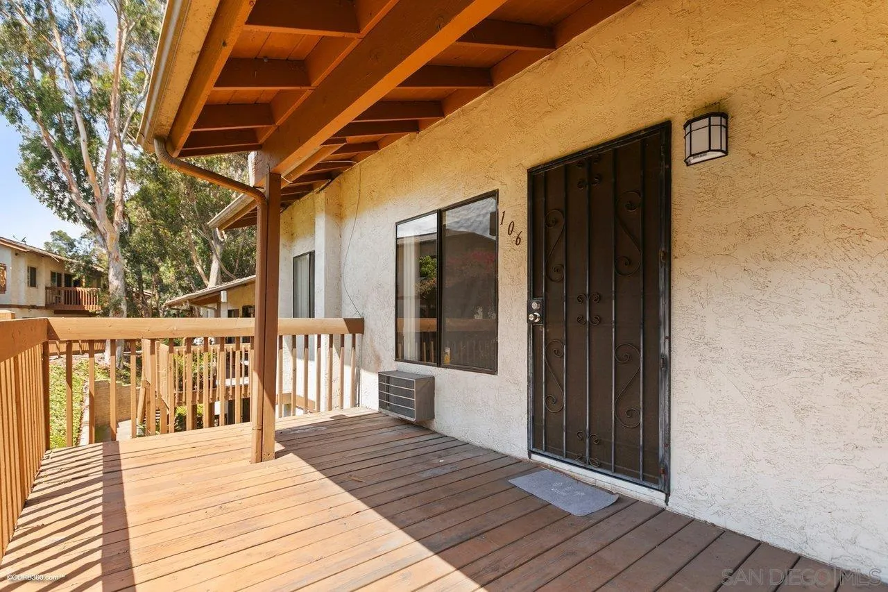 6394 Rancho Mission Road, Unit 106 San Diego, CA 92108 - Photo 2 of 23 a view of a house with wooden floor