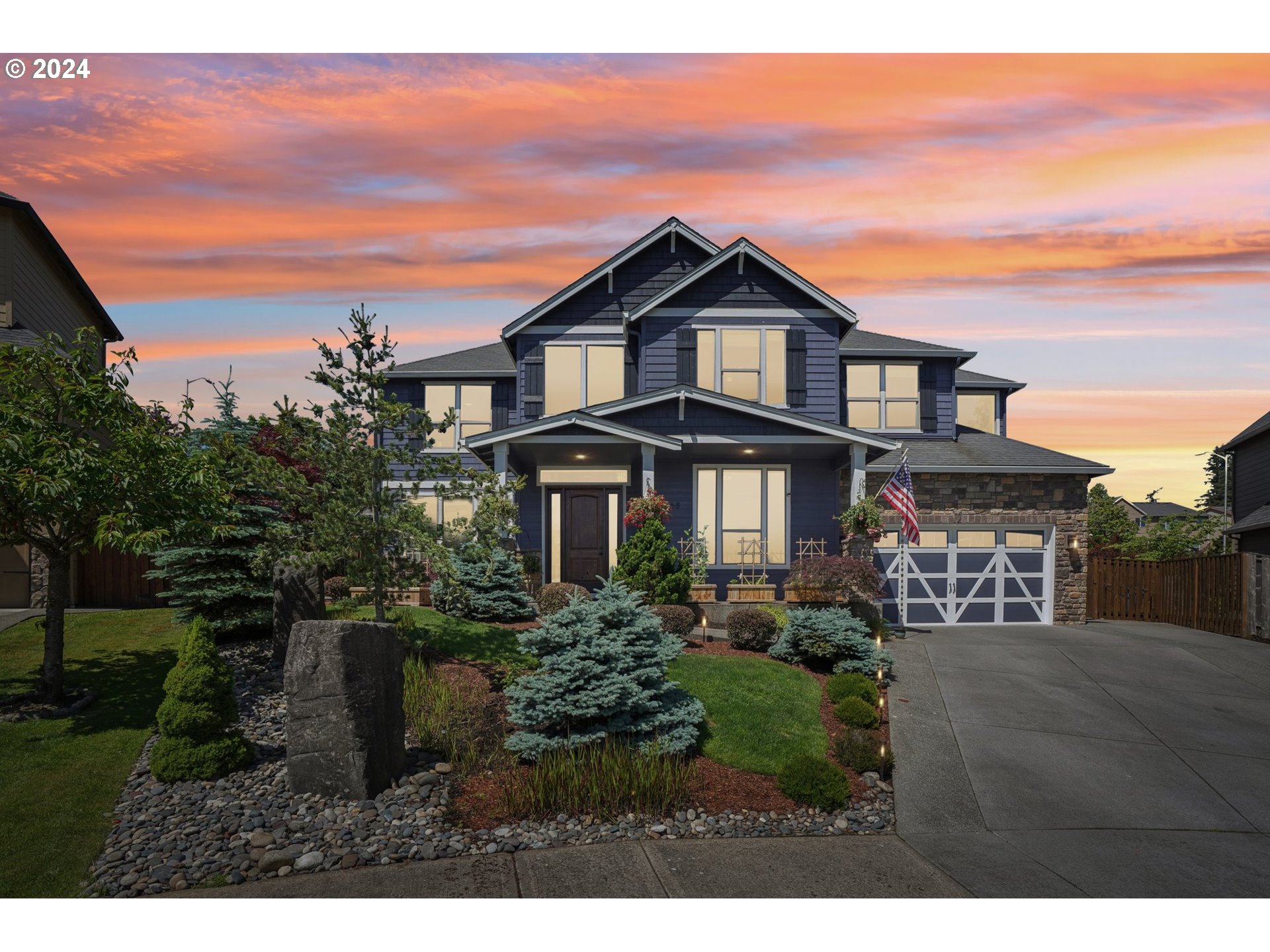 2368 Northwest 17th Avenue Camas, WA 98607 - Photo 2 of 47 a front view of a house with a yard