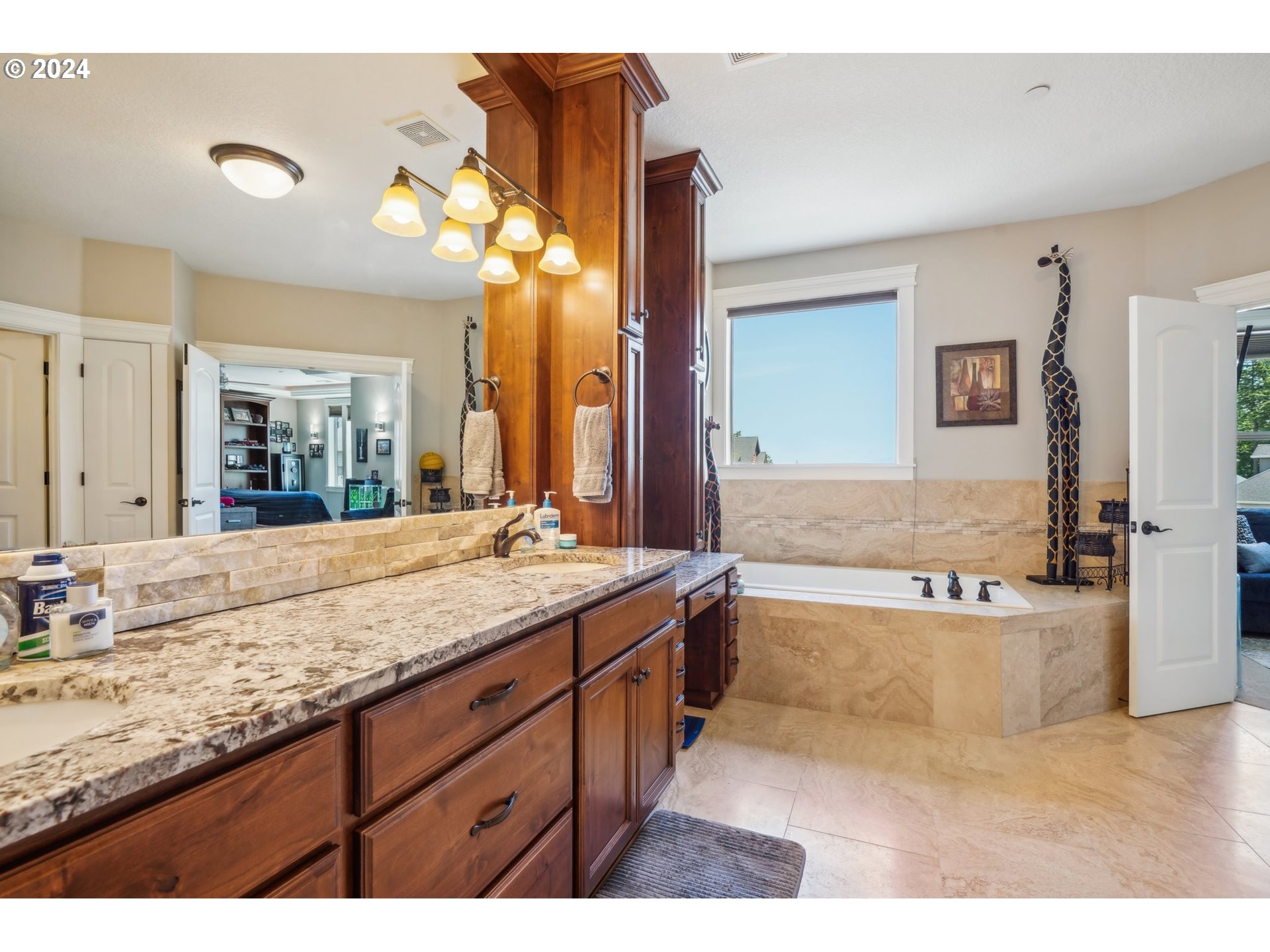 2368 Northwest 17th Avenue Camas, WA 98607 - Photo 24 of 47 a bathroom with a granite countertop sink mirror and bathtub
