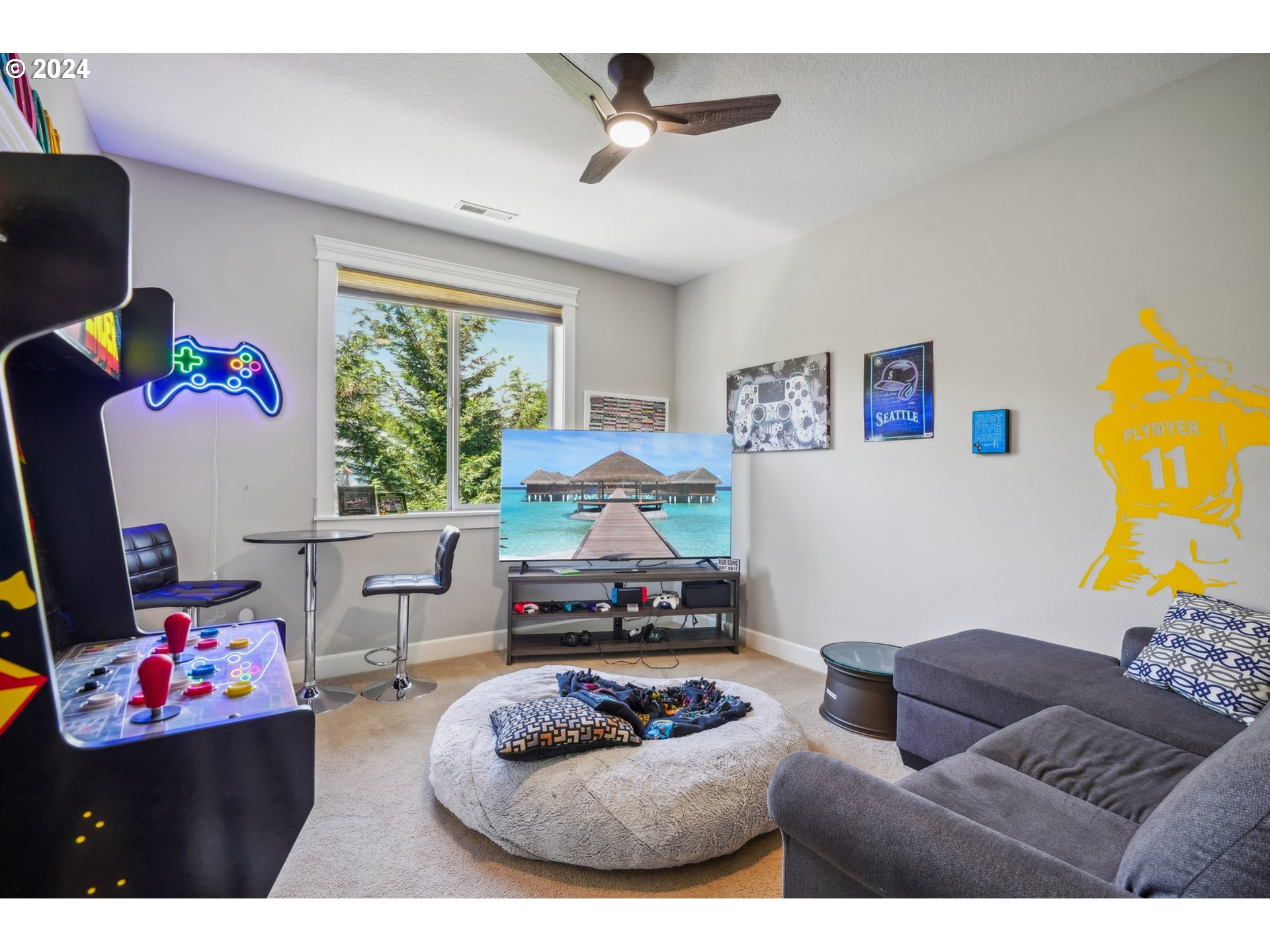 2368 Northwest 17th Avenue Camas, WA 98607 - Photo 29 of 47 a living room with furniture and a flat screen tv