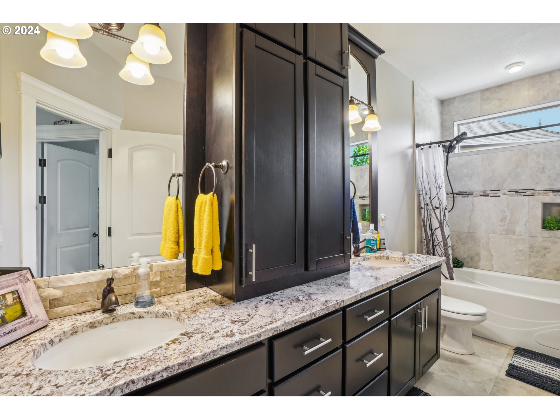 2368 Northwest 17th Avenue Camas, WA 98607 - Photo 33 of 47 a bathroom with a granite countertop sink and a mirror
