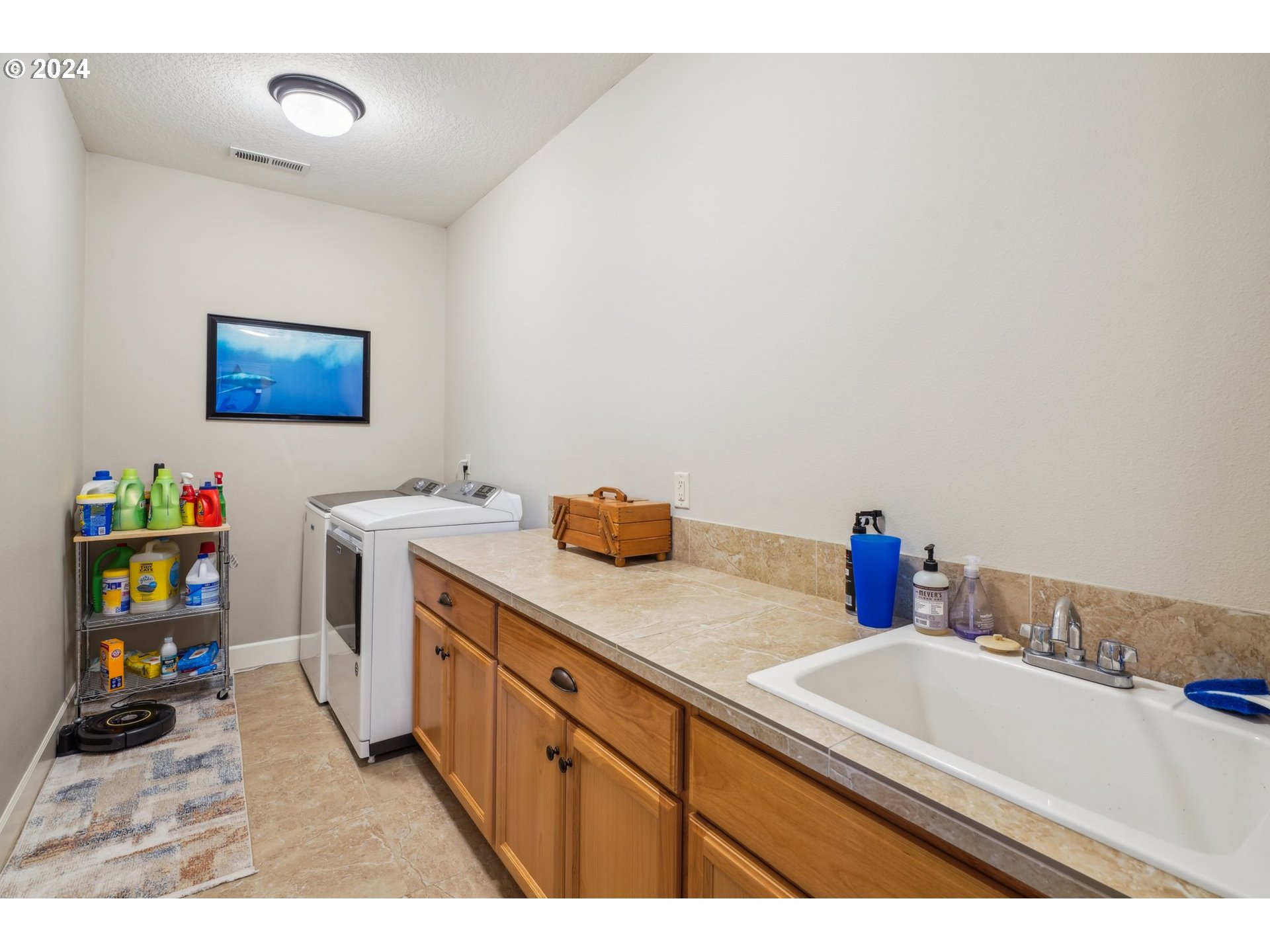 2368 Northwest 17th Avenue Camas, WA 98607 - Photo 34 of 47 a kitchen with a sink cabinets and a window