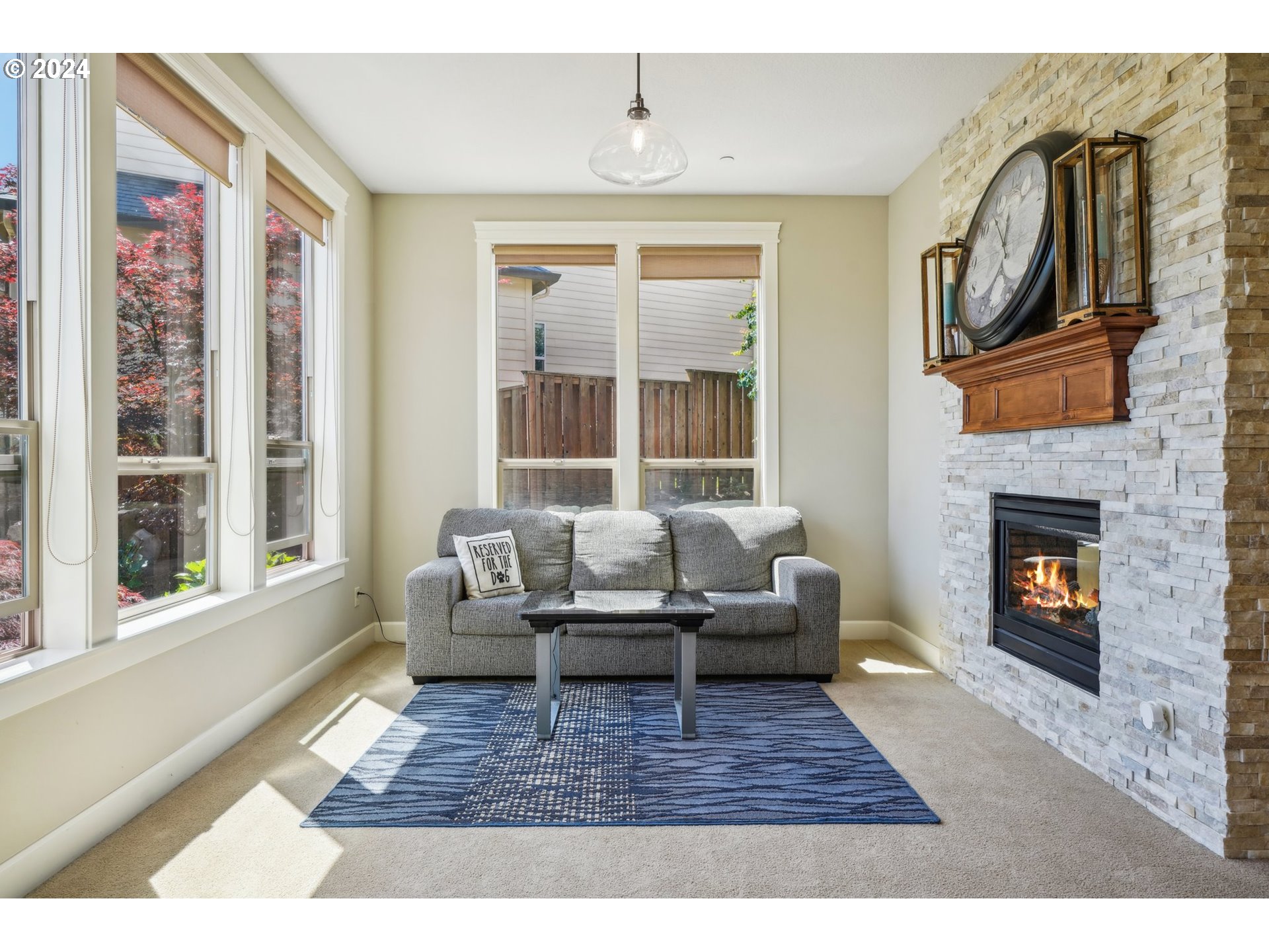 2368 Northwest 17th Avenue Camas, WA 98607 - Photo 5 of 47 a living room with furniture a window and a fireplace