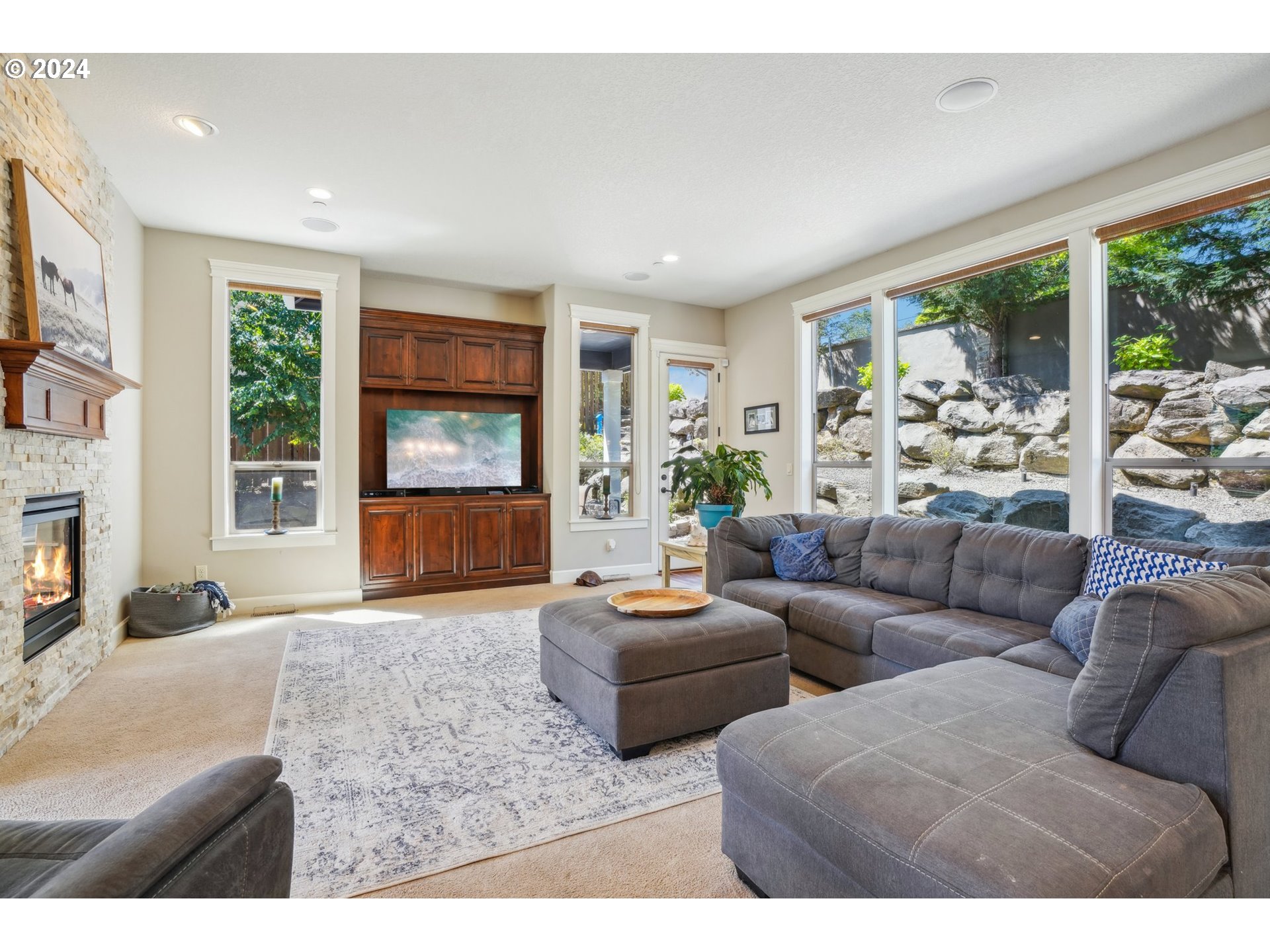 2368 Northwest 17th Avenue Camas, WA 98607 - Photo 8 of 47 a living room with furniture and a fireplace
