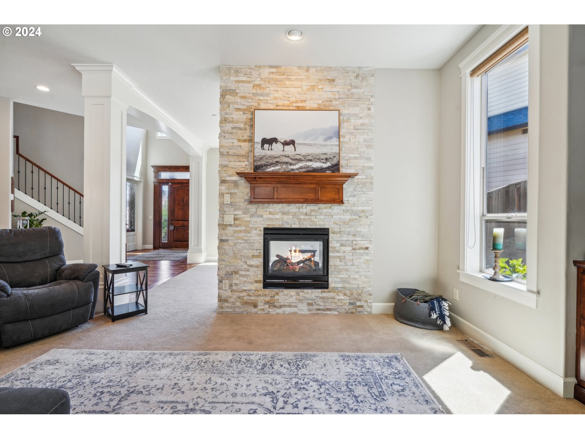 2368 Northwest 17th Avenue Camas, WA 98607 - Photo 9 of 47 a living room with furniture and a fireplace