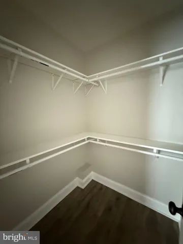 a view of an empty walk in closet
