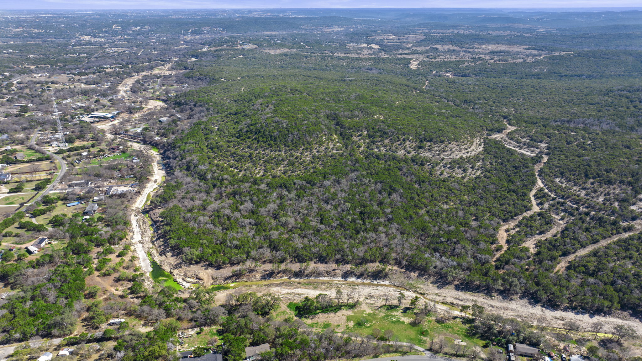 14101 Long Hollow Loop Leander, TX 78641 - Photo 4 of 6 Aerial view of a heavily wooded area