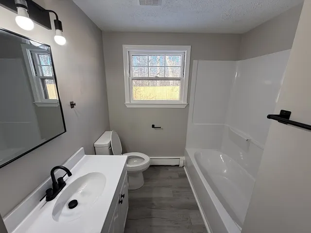 a bathroom with a sink and a bathtub