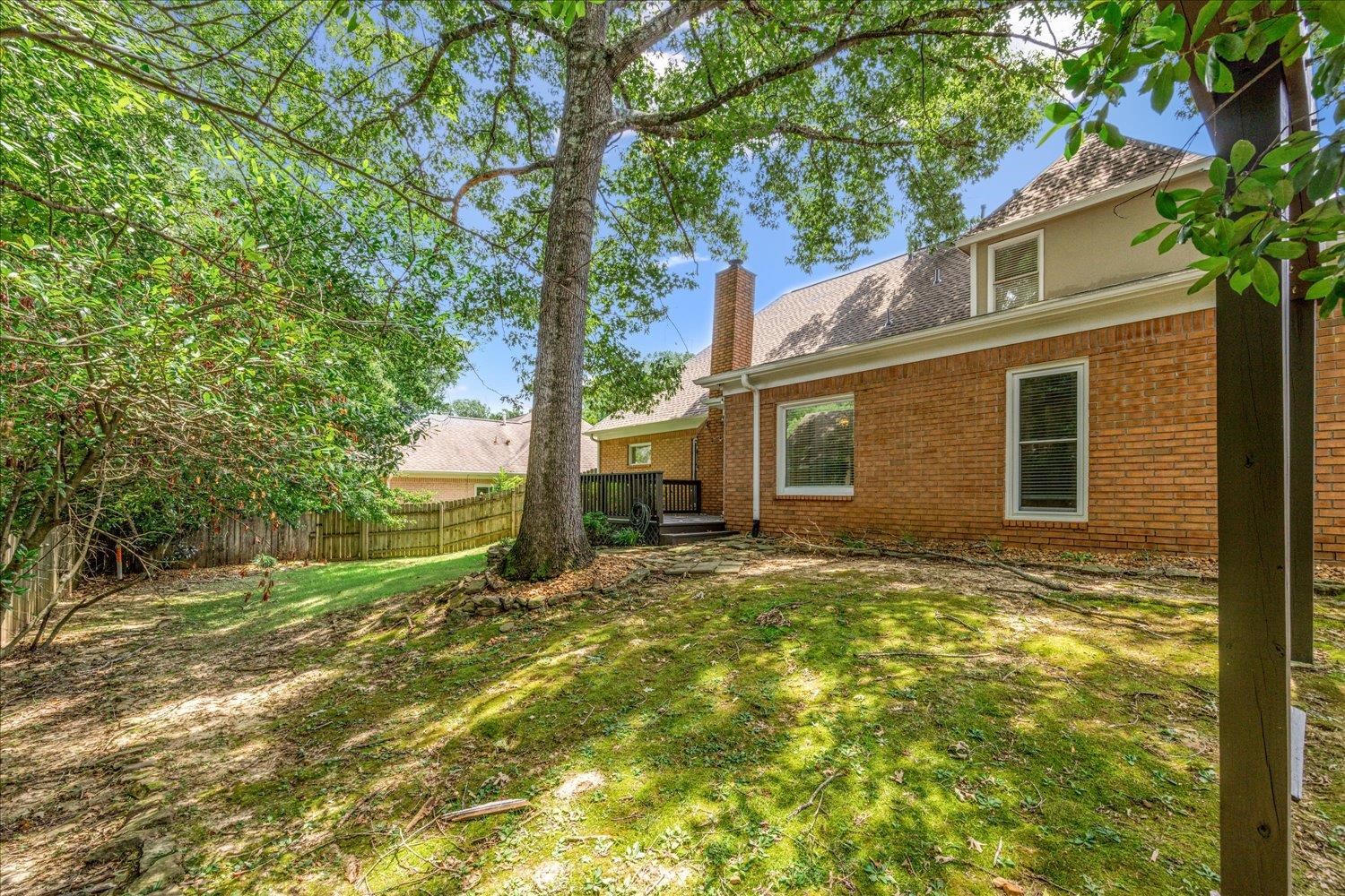 700 Belle Watley Lane Collierville, TN 38017 - Photo 11 of 30 Multi-level, fenced back yard with large deck