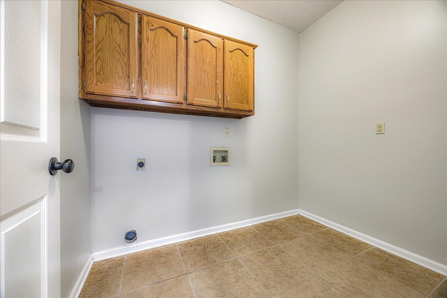 700 Belle Watley Lane Collierville, TN 38017 - Photo 24 of 30 a bathroom with a granite countertop window and a shower