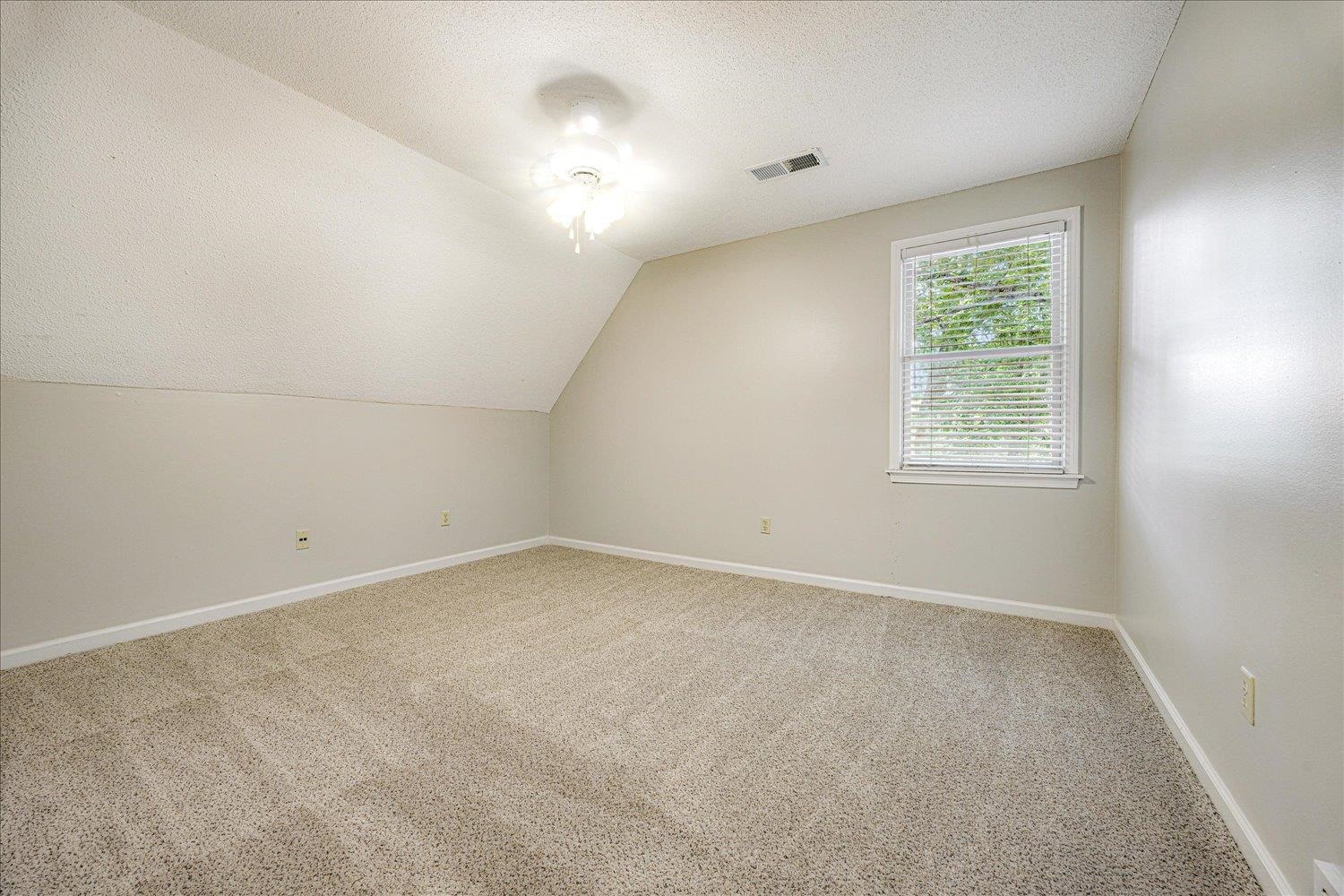 700 Belle Watley Lane Collierville, TN 38017 - Photo 5 of 30 an empty room with a window